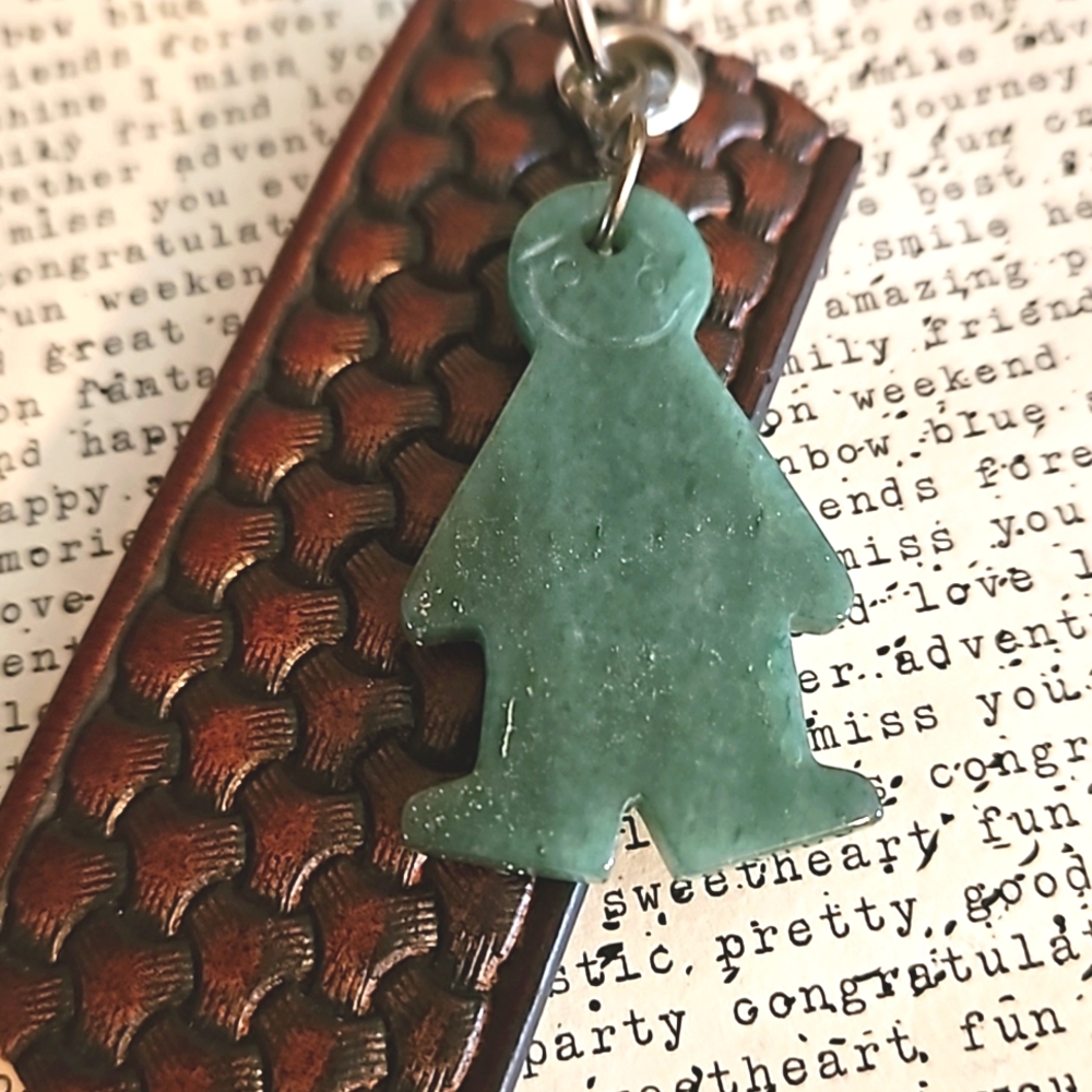 Carved Stone Charm On Vintage tooled leather keyring good luck charm ooak